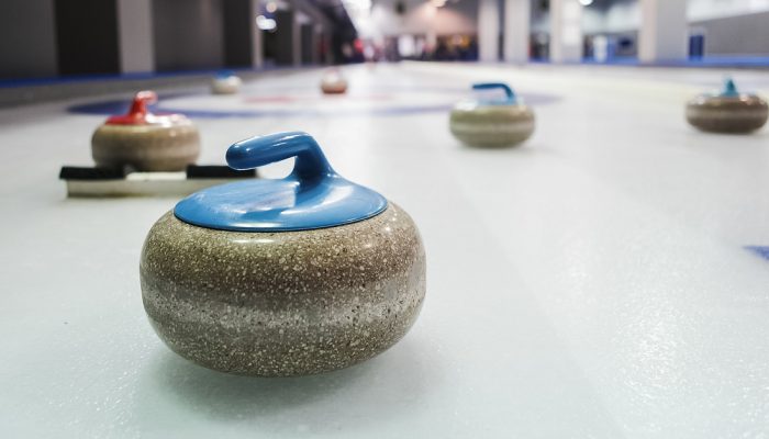 Curling stones on the ice
